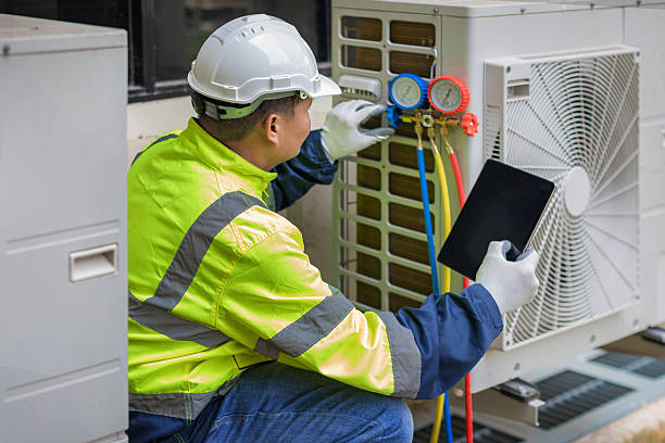 Professional Air Conditioning Repair technician working in Springfield, MA